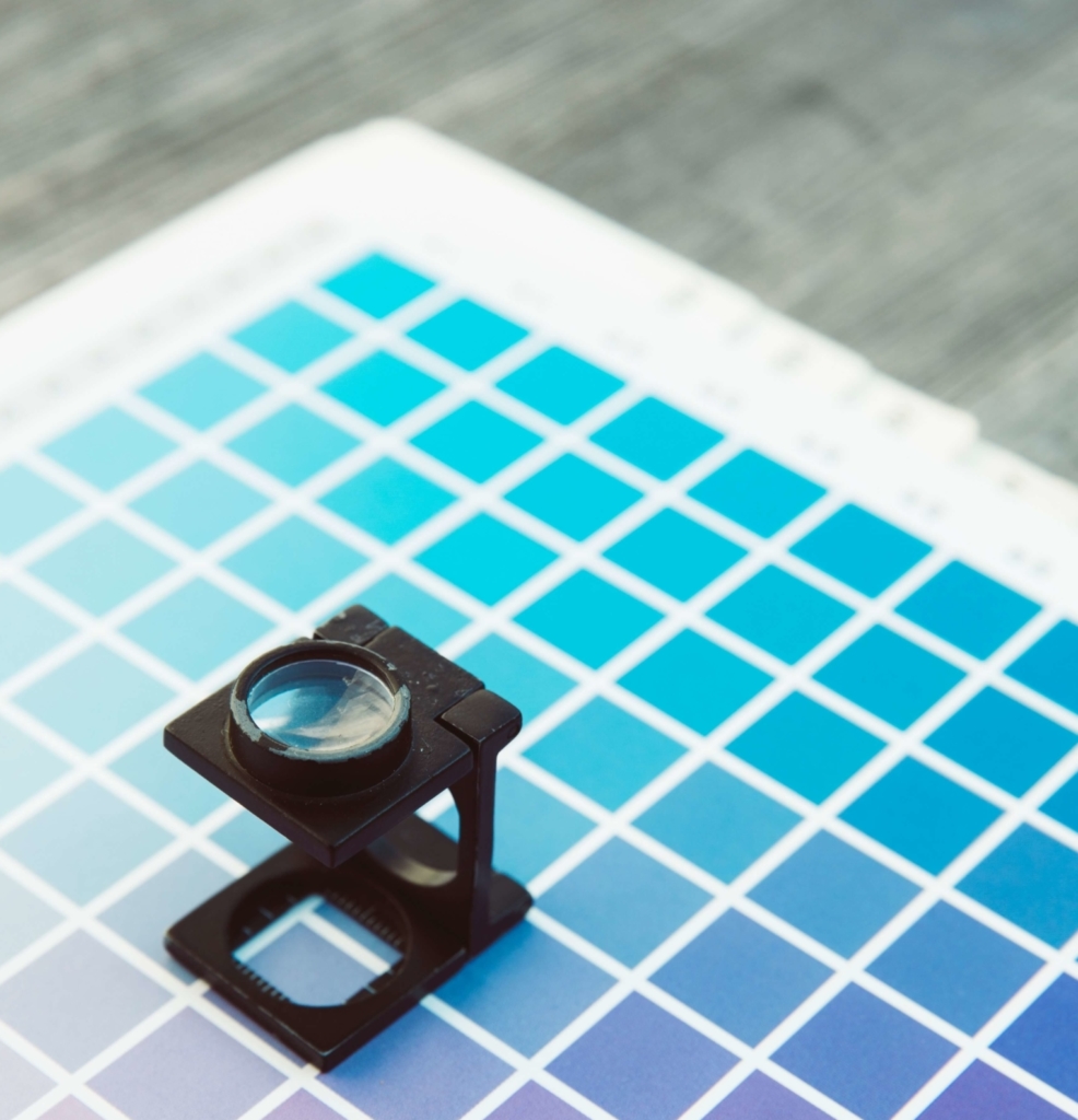 Magnifying glass on color chips